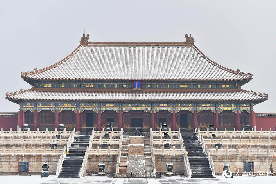 Enjoy the poetic beauty of Palace Museum coated in snow