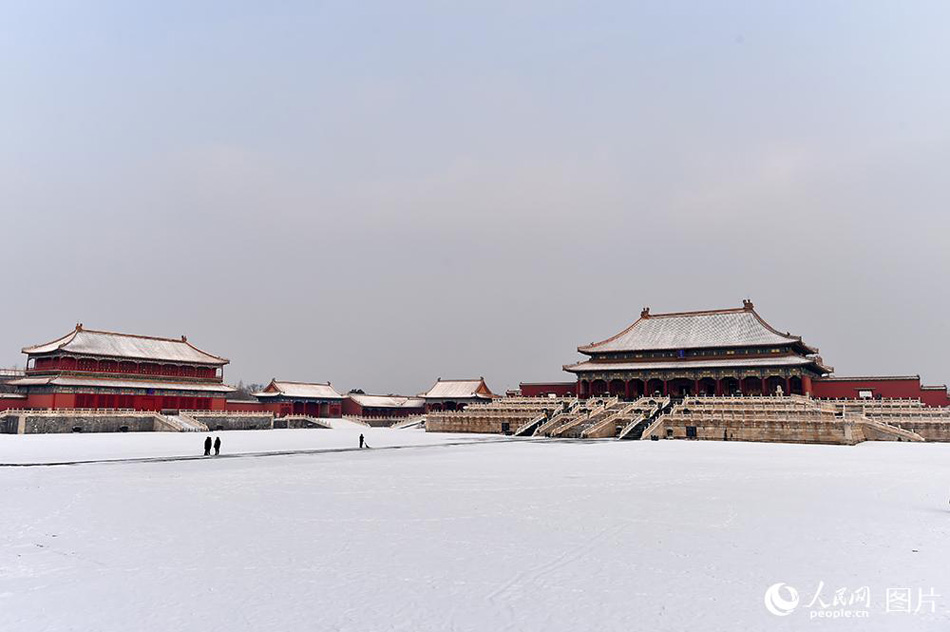 Enjoy the poetic beauty of Palace Museum coated in snow