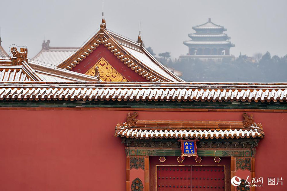 Enjoy the poetic beauty of Palace Museum coated in snow