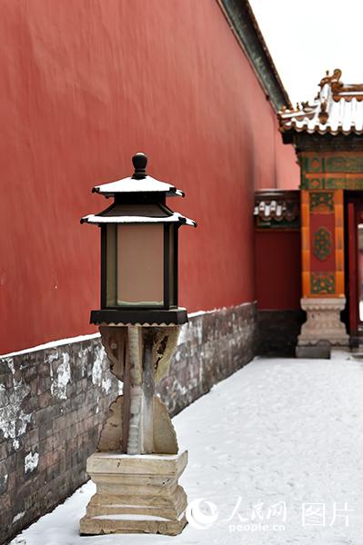 Enjoy the poetic beauty of Palace Museum coated in snow