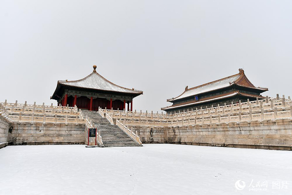 Enjoy the poetic beauty of Palace Museum coated in snow