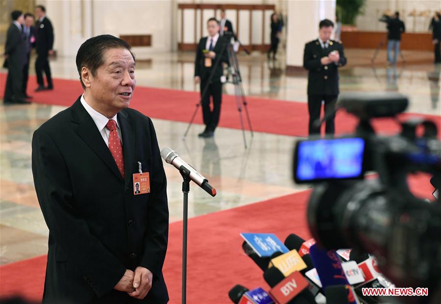 Ministers receive interviews before 2nd plenary meeting of 5th session of 12th NPC