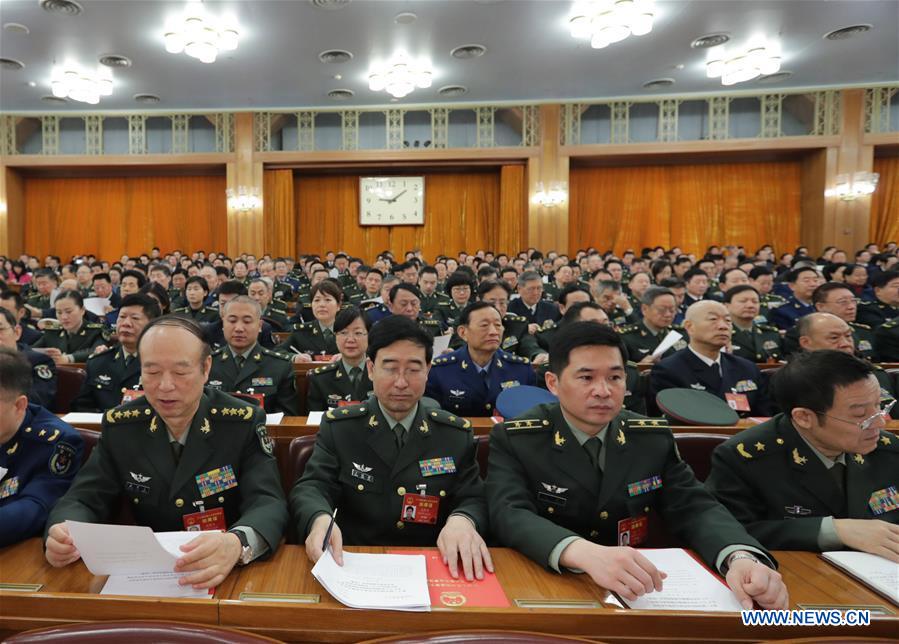 China's national legislature begins closing meeting of annual session