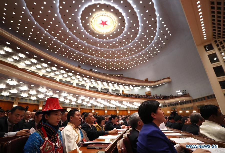 China's national legislature begins closing meeting of annual session