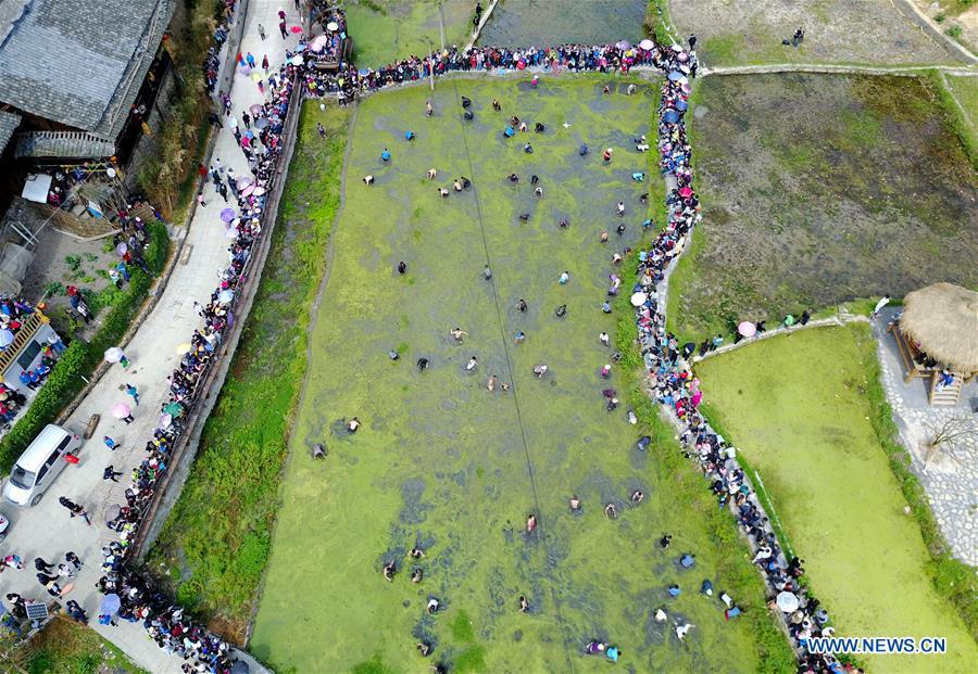 Fish-catching contest held in SW China