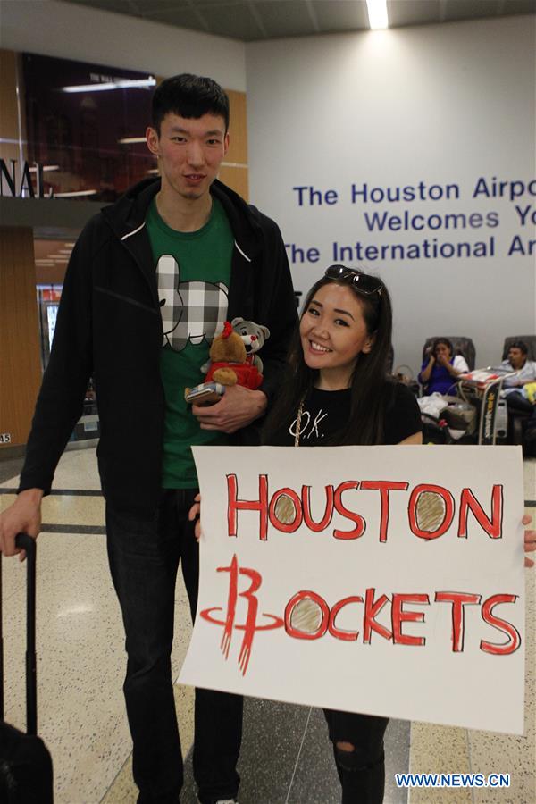 China's basketball player Zhou Qi arrives in Houston