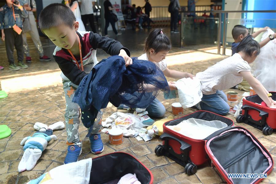 People enjoy Labor Day holiday across China