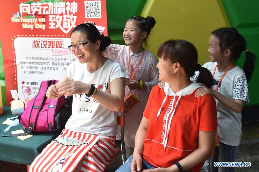 People enjoy Labor Day holiday across China