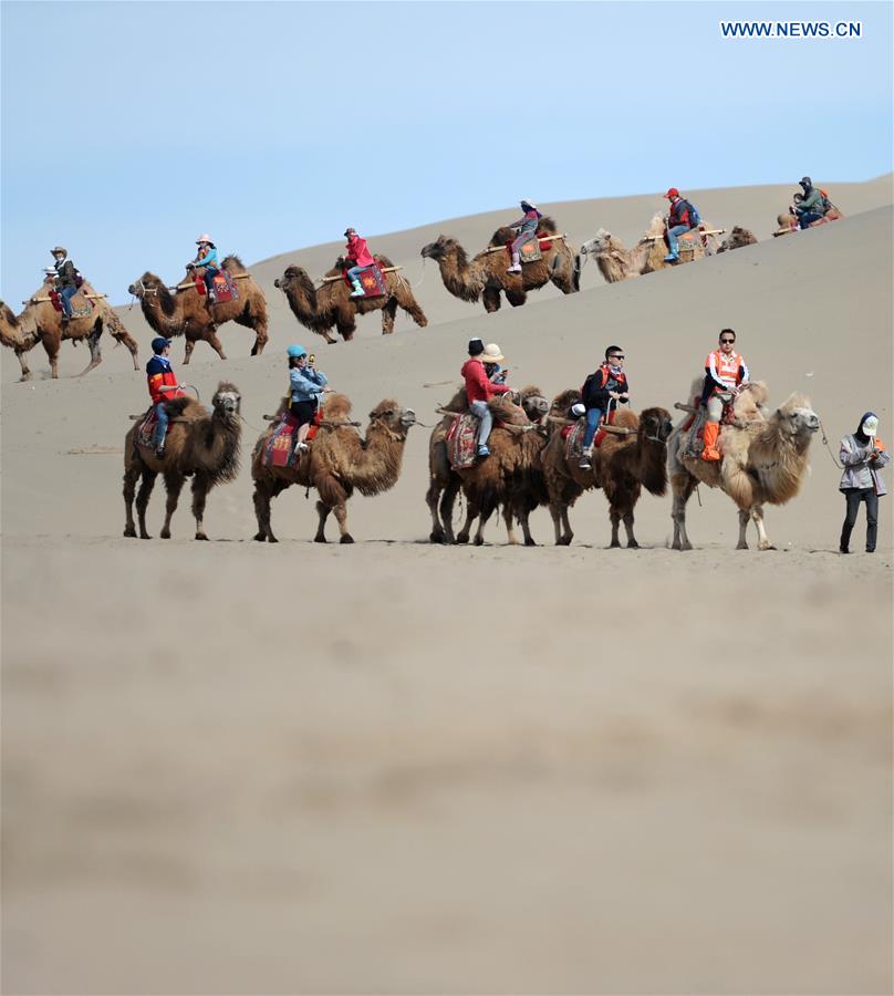 Mingsha Sand Mountain scenery zone in Dunhuang attracts tourists