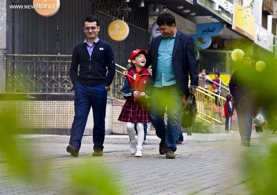 Fraidoun of Afghanistan runs carpet business in China's Xinjiang