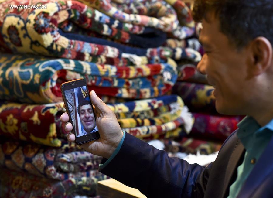 Fraidoun of Afghanistan runs carpet business in China's Xinjiang