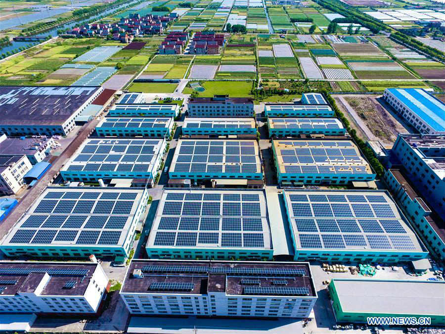 In pics: solar energy equipment on roof in E China