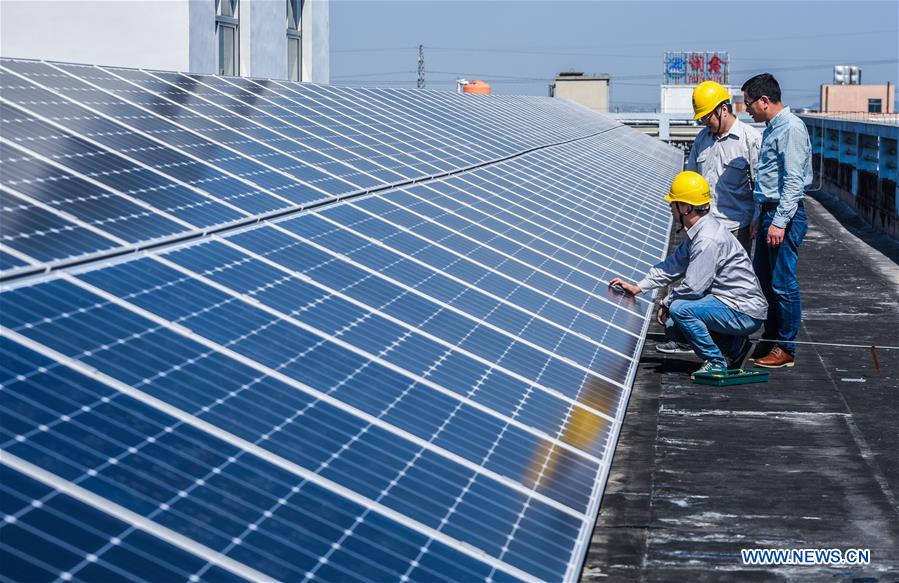 In pics: solar energy equipment on roof in E China