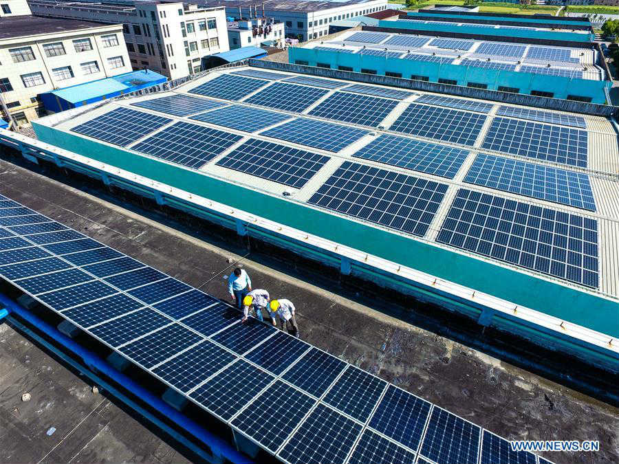 In pics: solar energy equipment on roof in E China