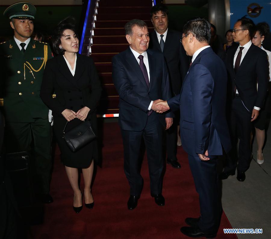 Uzbek President Shavkat Mirziyoyev arrives in Beijing