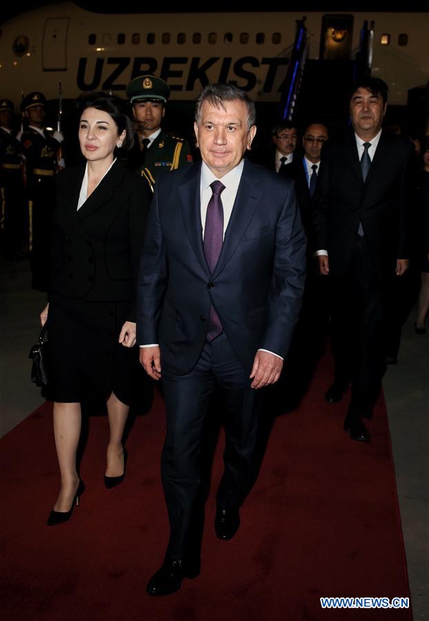 Uzbek President Shavkat Mirziyoyev arrives in Beijing