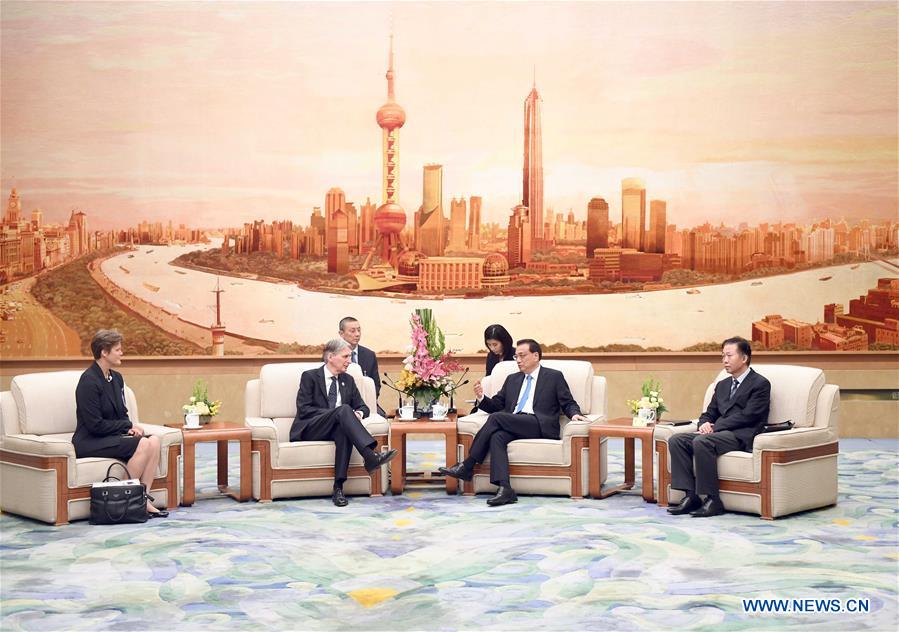 China, Britain vow closer cooperation, communication