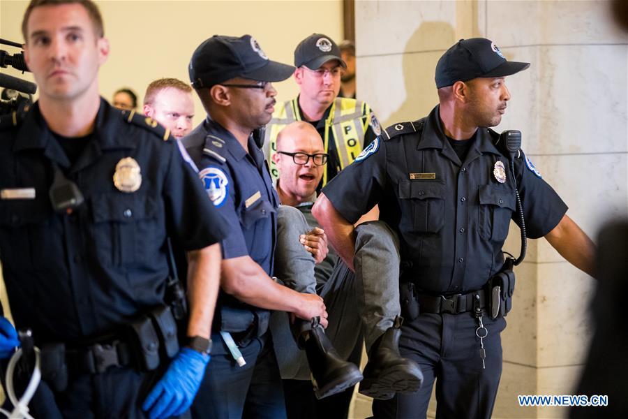 People protest against Republican health care bill in Washington D.C.