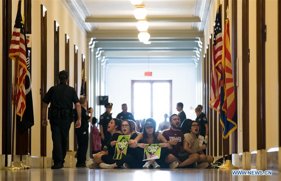 People protest against Republican health care bill in Washington D.C.