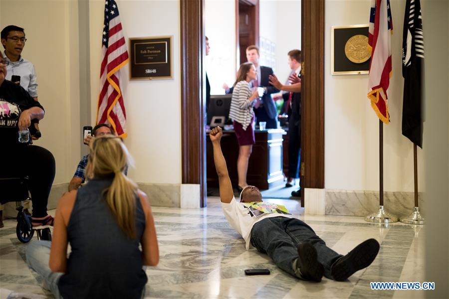 People protest against Republican health care bill in Washington D.C.