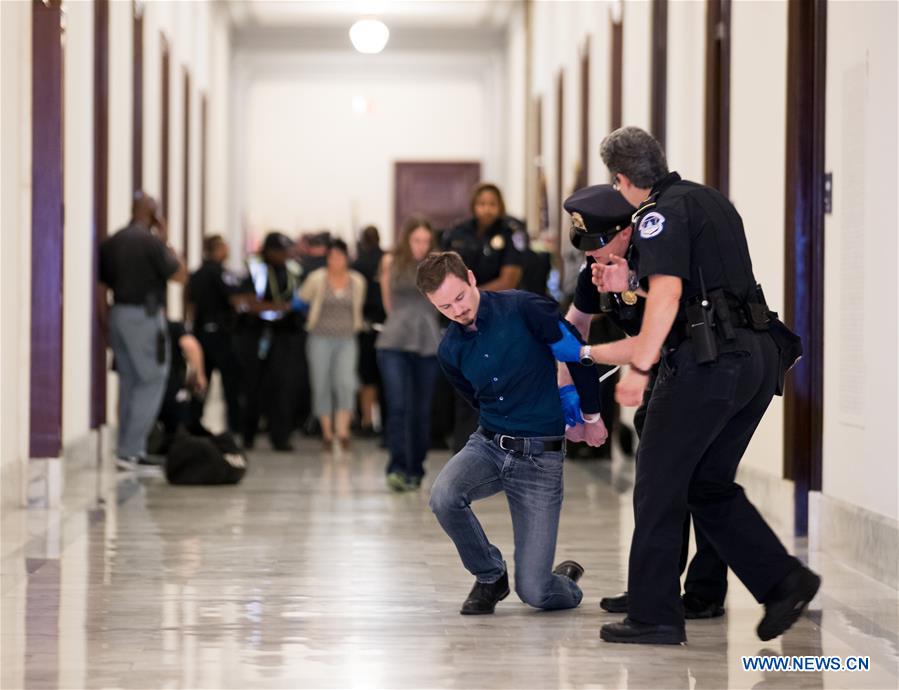 People protest against Republican health care bill in Washington D.C.