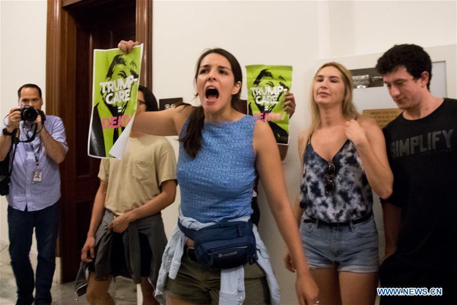 People protest against Republican health care bill in Washington D.C.