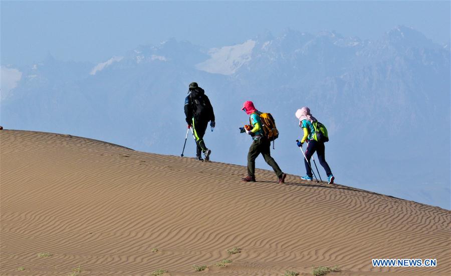 10 kilometer desert hiking challenge competition held in Zhangye, NW China