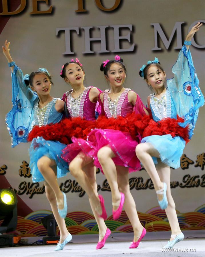 Children dance to celebrate Chinese Mid-Autumn Festival in Nepal