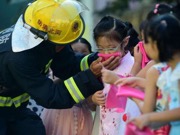 Children participate in drill of fire emergency