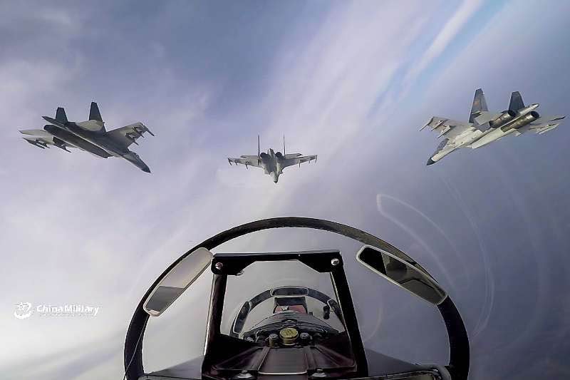 J-11B fighter jet conducts tactical maneuver