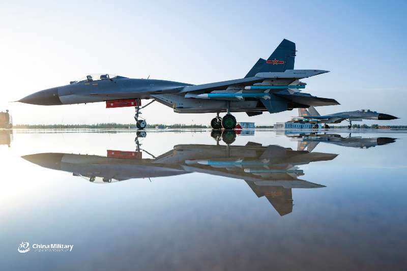 J-11B fighter jet conducts tactical maneuver