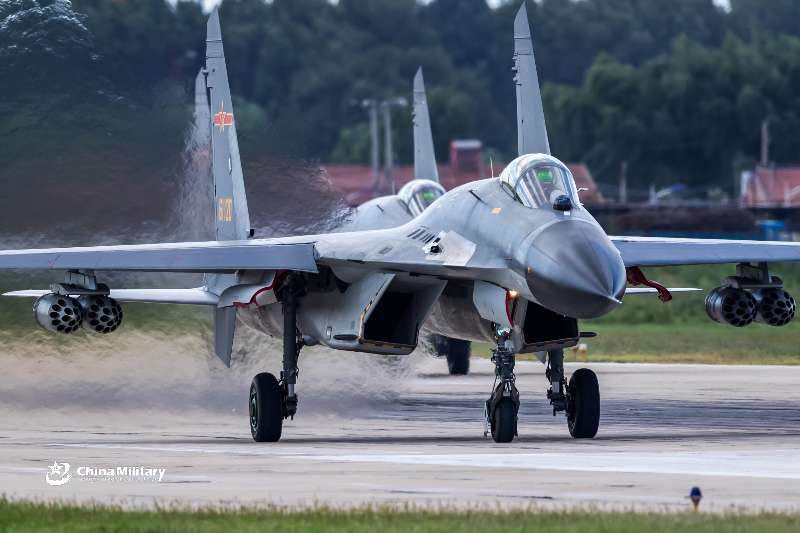 J-11B fighter jet conducts tactical maneuver