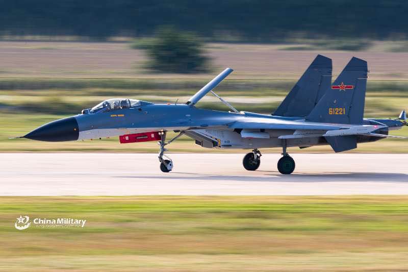 J-11B fighter jet conducts tactical maneuver