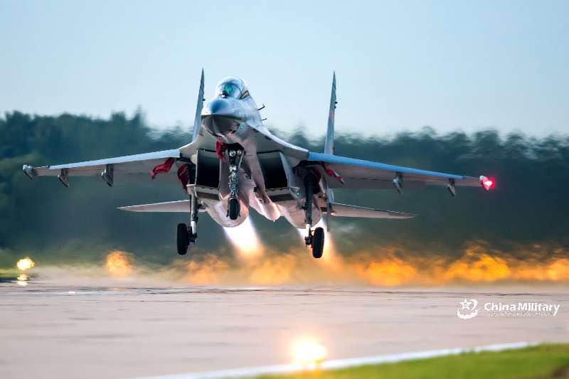 J-11B fighter jet conducts tactical maneuver