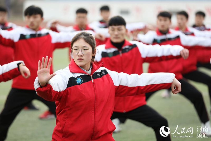 Students play Taiji between classes in Henan