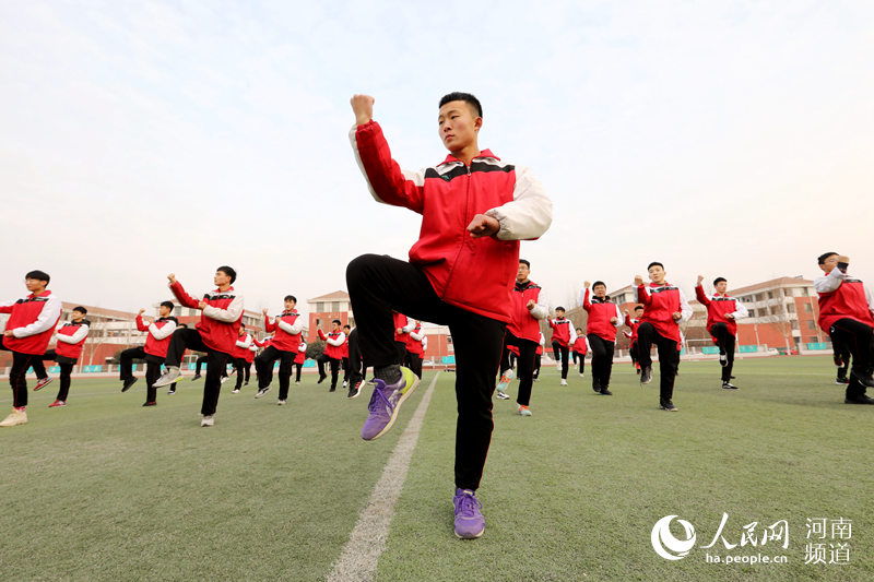 Students play Taiji between classes in Henan