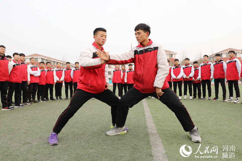 Students play Taiji between classes in Henan