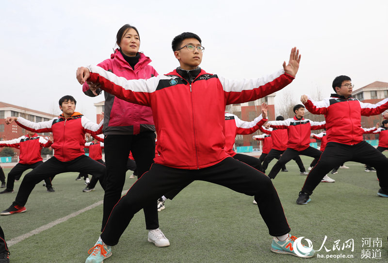 Students play Taiji between classes in Henan