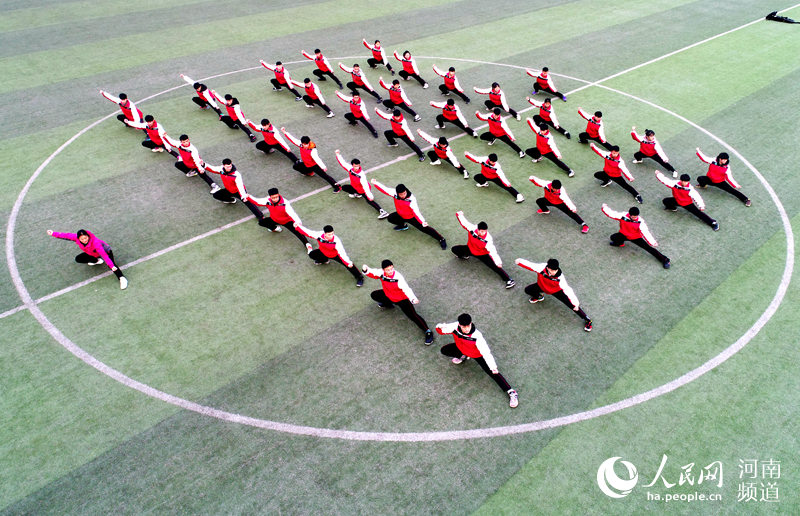 Students play Taiji between classes in Henan