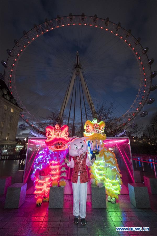 London Eye lit up in red and gold to celebrate Chinese New Year