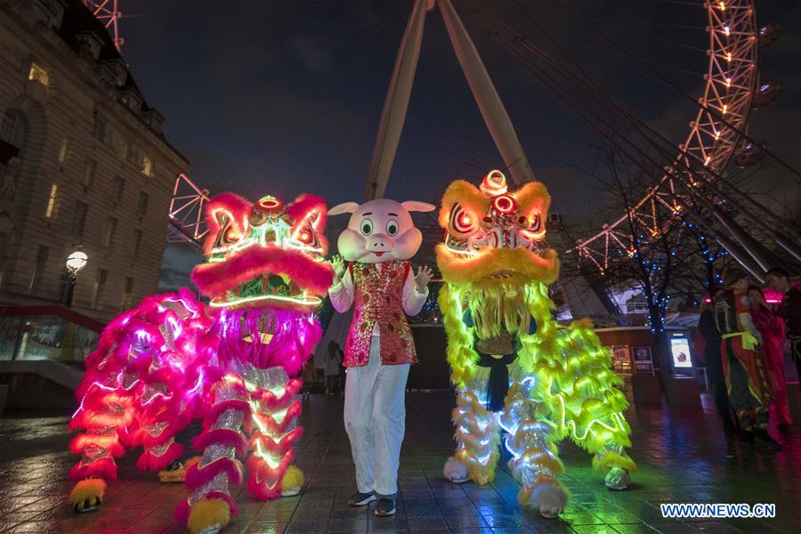 London Eye lit up in red and gold to celebrate Chinese New Year