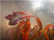 Villagers perform dragon dance to celebrate upcoming Lantern Festival