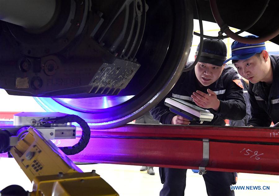 Robots employed in China's railway system during Spring Festival travel rush