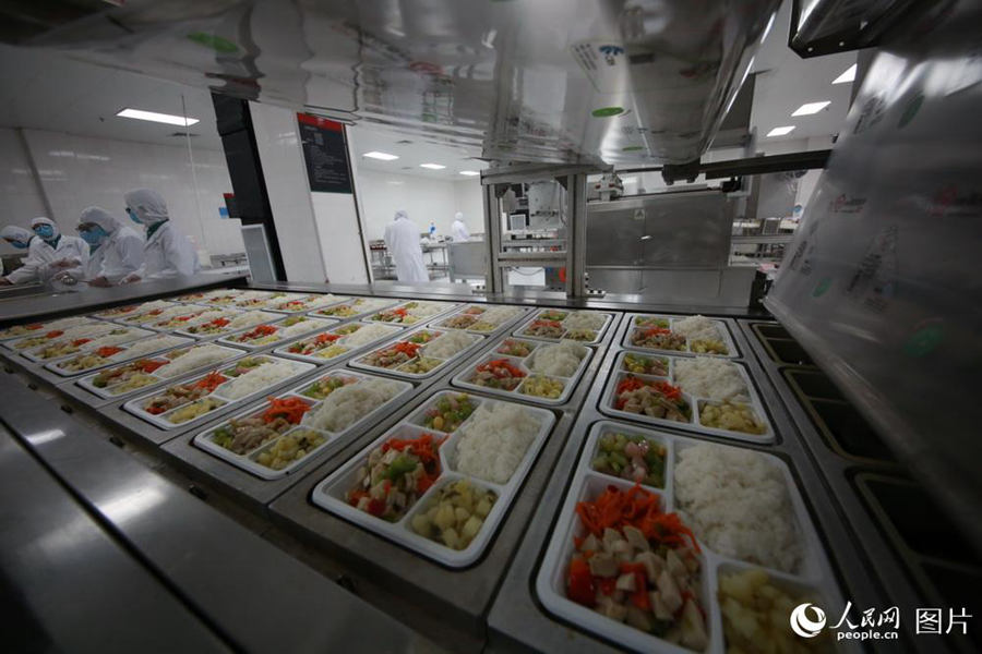 How are the boxed meals on China’s high-speed trains produced?