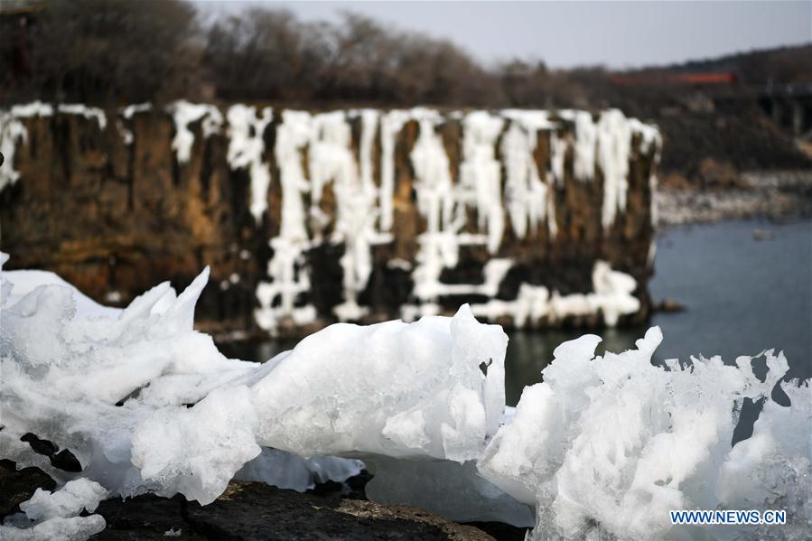 Scenery of frozen Diaoshuilou Waterfall in Heilongjiang, China