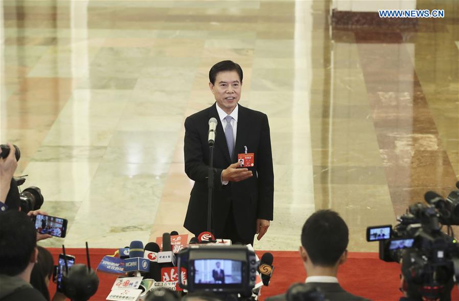 Ministers receive interview after opening meeting of second session of 13th NPC