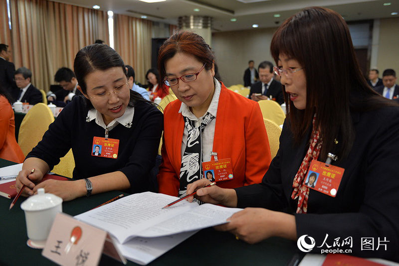 Int'l Women's Day marked at China’s Two Sessions