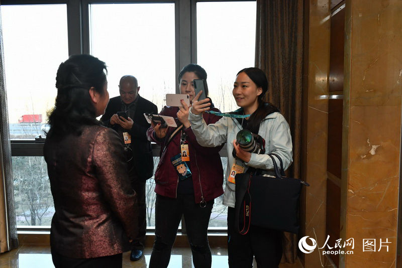 Int'l Women's Day marked at China’s Two Sessions