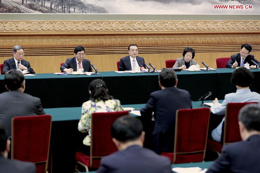 Chinese leaders stress reform, legislation, poverty relief