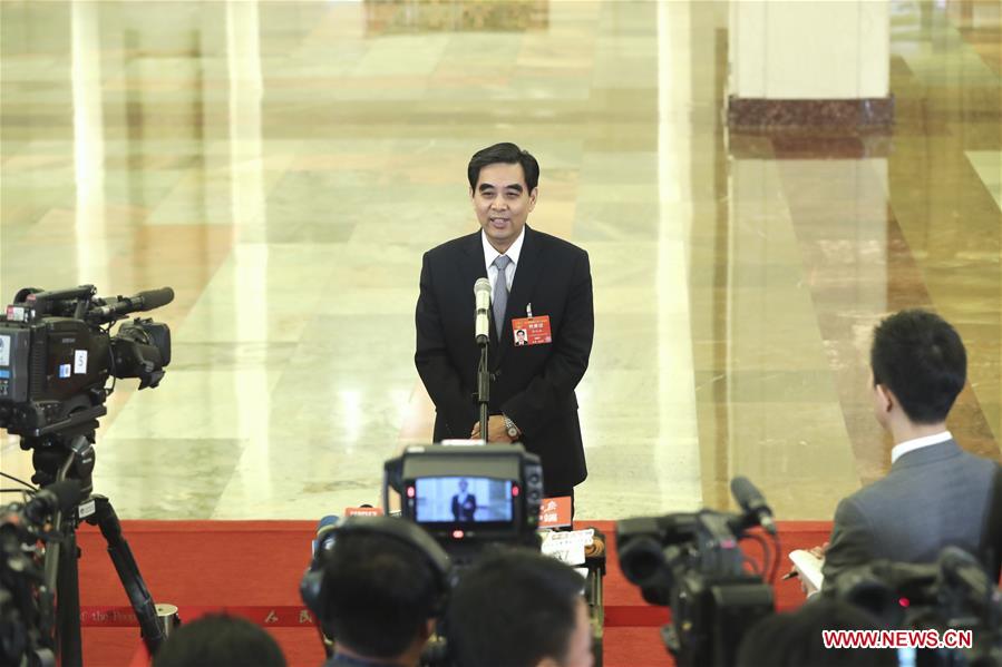 Ministers receive interview after 3rd plenary meeting of 2nd session of 13th NPC